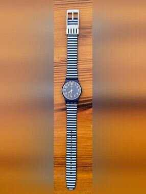Swatch Ora D'Aria Navy and White Striped Silicone Watch with Gold Accents